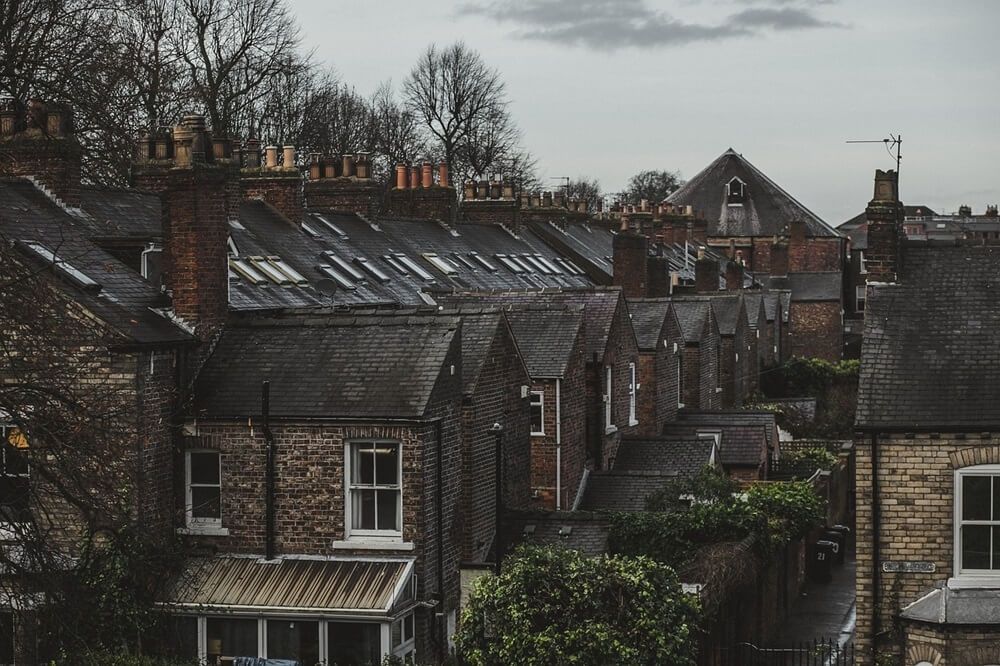 Old British houses with multiple chimneys